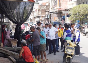 Pembenahan Drainase dan Proyek Rehabilitasi Jalan